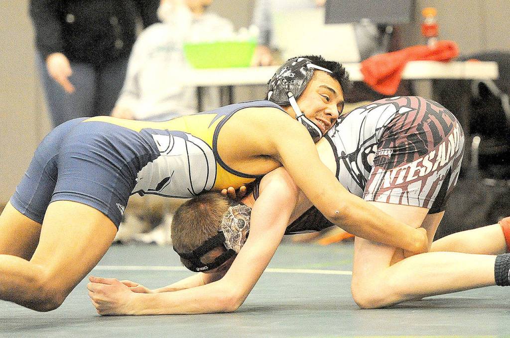 Forks Josue Lucas, the defending 106-pound state champion, won regionals again this year. (Lonnie Archibald/for Peninsula Daily News)