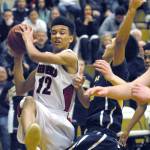 Neah Bays Sean Bitegeko, right, tries to shoot past Tacoma Baptists Kyongjin So in second quarter play on Tuesday at Port Angeles High School.                                Keith Thorpe/Peninsula Daily News