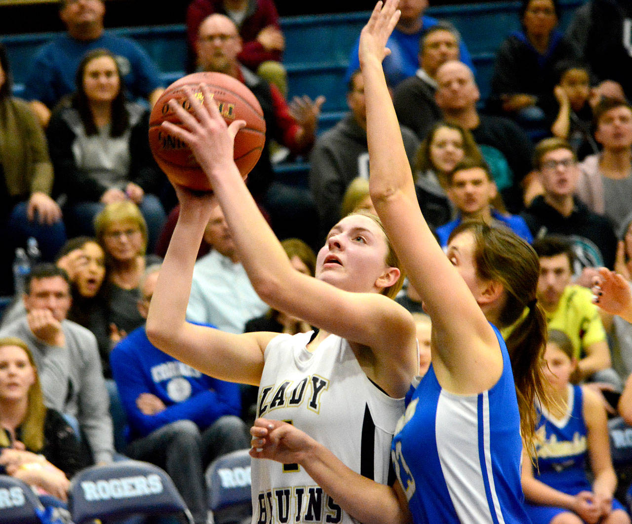 Mark Krulish/Kitsap News Group Clallam Bays Miriam Wonderly drives to the basket in the 1B Regionals against Columbia Adventist at Rogers High School in Puyallup on Saturday. Columbia Adventist won 52-43, ending the Bruins season.
