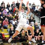 David Willoughly/for Peninsula Daily News Madison Cooke for Port Angeles looks to shoot against Archbishop Thomas Murphy in Saturdays 1A Regionals game.