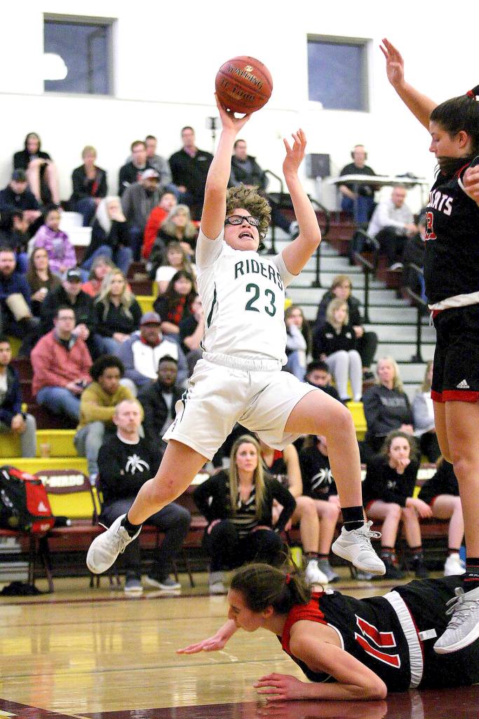 David Willoughly/for Peninsula Daily News Madison Cooke for Port Angeles looks to shoot against Archbishop Thomas Murphy in Saturdays 1A Regionals game.
