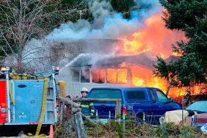 Fire flares back up at destroyed house near Port Angeles