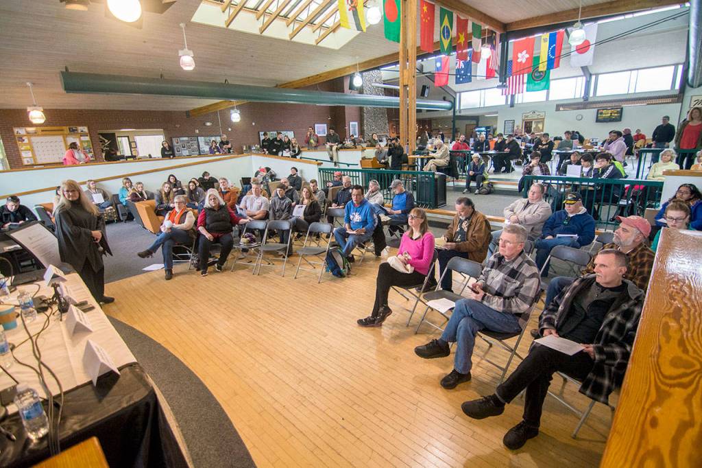 Upward of 75 people packed into the Pirate Union Buildiing at Peninsula College for a forum on gun violence at schools. (Jesse Major/Peninsula Daily News)