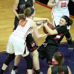 David Willoughby/for Peninsula Daily News                                Neah Bays Patience Swan, right, scraps for possession of the ball during with Pomeroys Maddy Dixon during the Red Devils 44-29 Class 1B state semifinal loss Friday at Spokane Arena.