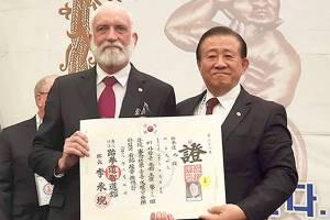 AREA SPORTS BRIEFS: Martial arts expert honored; Women’s Basketball League forming in Port Angeles; Roller derby bout Saturday in Sequim