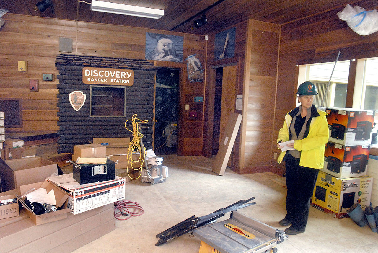Olympic National Park historical architect Ellen Gage surveys work being done in the childrens Discovery Room in the parks Port Angeles visitor center. (Keith Thorpe/Peninsula Daily News)