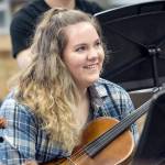 Port Angles High School senior Lauren Waldron laughs after cracking a joke in her Chamber Orchestra class Monday. She recently learned she had earned the National Federation of Music Clubs Wendell Irish Viola Award. (Jesse Major/Peninsula Daily News)