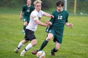PREP SOCCER: Port Angeles boys overcome rain, Port Townsend