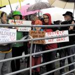 Community supporters rallied at Port Townsend High School to support the student walkout Wednesday. About 75 people held signs and cheered on the students as they demonstrated to bring awareness to gun violence in schools. (Jeannie McMacken/Peninsula Daily News)