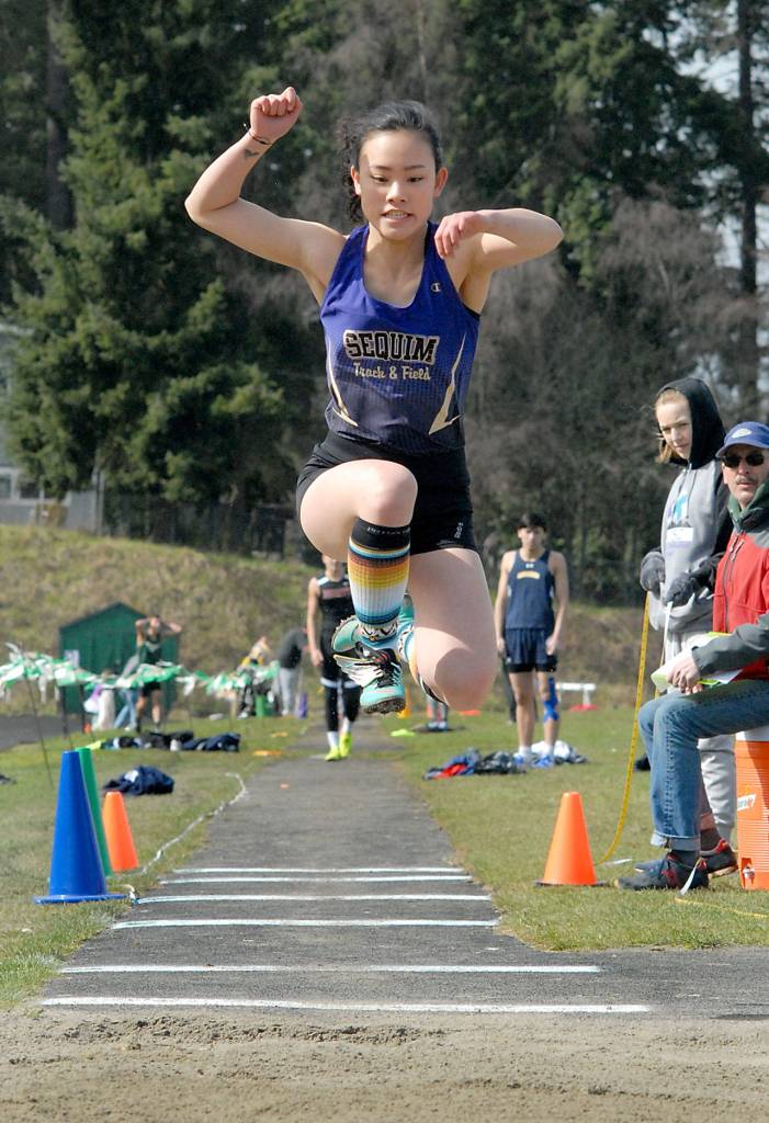 Elizabeth Sweet of Sequim competes in the girls triple jump during Saturdays Port Angeles Invitational meet at Port Angeles High School. (Keith Thorpe/Peninsula Daily News)