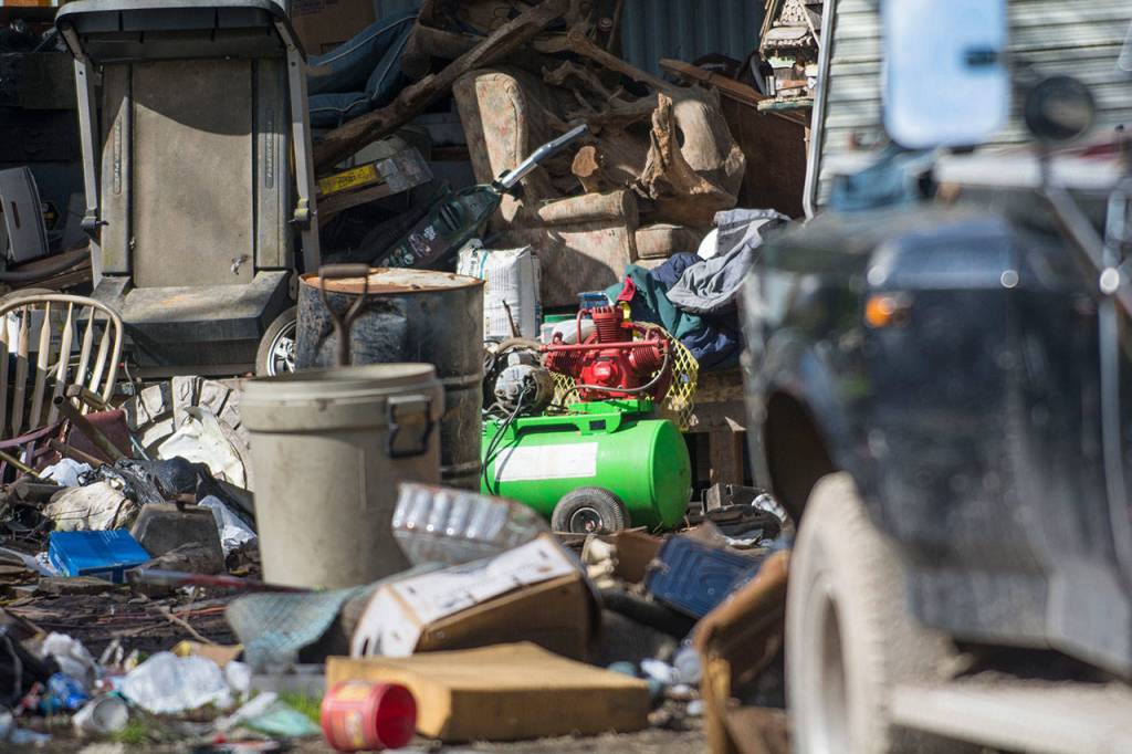 Clallam County is seeking a warrant of abatement for the property at 313 McDonnell Creek Road, which is covered in garbage, junk vehicles and doesnt properly manage sewage, according to a lawsuit. (Jesse Major/Peninsula Daily News)