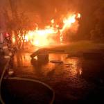 Firefighters battle a blaze at a home outside of Forks early Friday morning. (District 1 Chief Bill Paul)