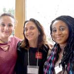 Port Townsend High School student Callay Boire-Shedd, left, presented a program Thursday about suicide prevention to her classmates. Central to the event was the screening of the film The S Word, a documentary that focuses on survivors of suicide. Filmmaker Lisa Klein, center, presented her film to about 150 students, and Kelechi Ubozoh, one of the featured subjects, was on hand to tell her story. (Jeannie McMacken/Peninsula Daily News)