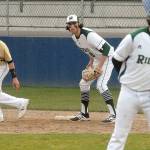 Sequims Michael Young, left, takes a lead off as he watches Port Angeles pitcher Brady Shimko, right, as Roughrider first baseman Bo Bradow waits for delivery in the first inning on Wednesday evening at Port Angeles Civic Field.                                Keith Thorpe/Peninsula Daily News