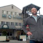 Erik Marks, the new owner of The Landing mall, stands in front of his building near the Port Angeles waterfront. (Keith Thorpe/Peninsula Daily News)