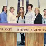 Receiving checks from the Dungeness Valley Lutheran Church on March 29 were, from left, Priya Jayadev, executive director, Clallam Mosaic; Rebekah Miller, development associate, Peninsula Behavioral Health; Nicole Brewer, executive director, First Teacher; Linda DeMoss, vice president, Sequim Community Aid; Maria Davila, shelter manager, and Katie Spooner, victim advocate, both of Forks Abuse Program; Carol Pope, North Olympic Foster Parent Association; Klara Murray, volunteer, and John Braasch, president, both of Voices for Veterans, with Braaschs service dog Sadie.