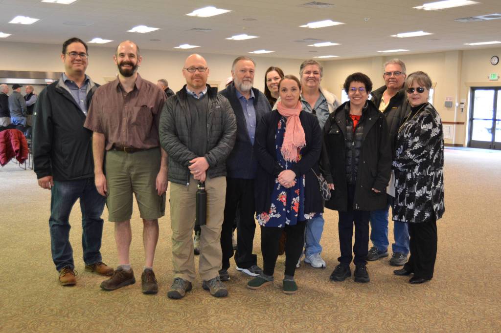Members of Guy Coles family attended the ribbon cutting last Wednesday, which commemorated Coles work as a community advocate, along with Judy Reandeau Stipe, executive director of the Sequim Museum and Arts, on right. (Matthew Nash/Olympic Peninsula News Group)