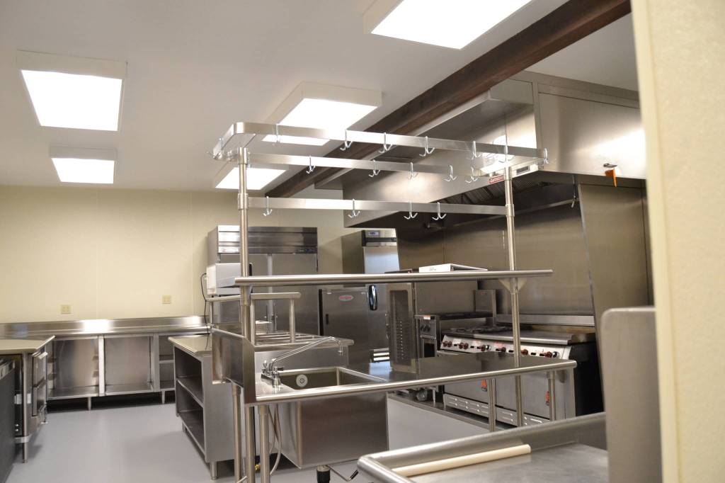 Work to refurbish the Guy Cole Events Centers kitchen included installing a new oven hood and fire suppression system, a freezer, ice machine, lighting, and flooring along with providing electrical and plumbing hookups for future items. (Matthew Nash/Olympic Peninsula News Group)