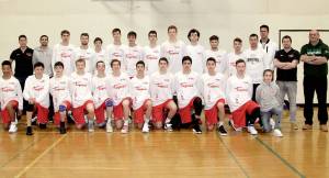 About 25 kids on eighth-grade and U-18 squads from Luxembourg played in the Port Angeles Parks and Rec April FoolsDay Tournament this weekend. Port Angeles High School coach Kasey Ulin (fourth from right, middle row), who playedprofessionally in Luxembourg, and his wife Bracey coached these kids in Luxembourg and helped make arrangements tobring them to Port Angeles to play. (Dave Logan /for Peninsula Daily News)
