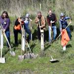 Members of The Food Co-op board take part in a ceremonial groundbreaking Tuesday to signal the expansion of its building on Kearney Street. The construction project will add 2,900 square feet to the buildings footprint allowing a wider selection of produce and natural products to be offered. From left are President Monica LaRoux, Secretary Lisa Barclay, Vice President Owen Rowe, Board member David Johnson, Board member Dylan Carter and General Manager Kenna Eaton. (Jeannie McMacken/Peninsula Daily News)