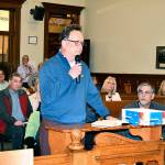 Statesman Group CEO Garth Mann addresses the county commissioners Monday night on his companys plans to develop the Pleasant Harbor Master Planned Resort in Brinnon. Mann said he was committed to doing a good job and to make the area better for your children and grandchildren. (Jeannie McMacken/Peninsula Daily News)