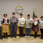 Sequim City Council members, from left, Mayor Dennis Smith, Jennifer States, Ted Miller, Bob Lake, Brandon Janisse, Pam Leonard-Ray, and Deputy Mayor Candace Pratt stand together after a presentation on the City of Sequims 2017 Annual Report. Matthew Nash/Olympic Peninsula News Group