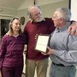 Marrowstone Island Citizens of the Year, from left, Nicole and Wayne Chimenti, are shown with former Citizen of the Year Mike Zimmerman.