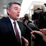 In this Jan. 22, file photo Sen. Cory Gardner, R-Colo., left, speaks to the media after attending a meeting with a bipartisan group of senators on day three of the government shutdown on Capitol Hill in Washington, D.C. (Jacquelyn Martin/The Associated Press)