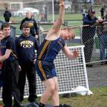 Forks Luke Dahlgren competes in the shot put at the Forks Lions Club Invitational in Forks on Saturday. Dahlgren won the event with a distance of 39 feet, 5 1/2 inches. (Lonnie Archibald/for Peninsula Daily News)