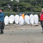 Kelsie Donleycott, the 2017 CoastSaver of the Year, is pictured at right with an unidentified friend cleaning up the coast near Ozette last year.