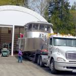 A Bristol Bay boat is loaded on a lowboy trailer for transport to the Port Angeles Boat Yard to be launched. (David G. Sellars/for Peninsula Daily News)