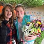 Last Friday, Paige Krzyworz was surprised by her mom Heidi and fifth-grade teacher Gail Kite, pictured, to learn she sold the most Girl Scout cookies in Western Washington. Girl Scouts of Western Washington sent a bouquet to Helen Haller Elementary to celebrate. (Heidi Krzyworz)