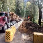 Traffic passes excavation work on U.S. Highway 101 at Lake Crescent. (Marty Flores)