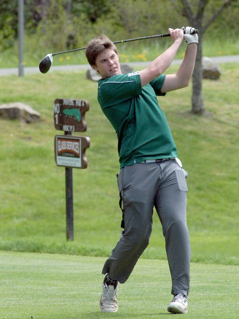 Keith Thorpe/Peninsula Daily News Skyler Cobb of Port Angeles tees off on the first hole of the Duke Streeter Invitational on Friday at Peninsula Golf Club.
