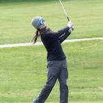 Keith Thorpe/Peninsula Daily News Port Angeles Cameron Fouts shoots for the green on the first hole of the Duke Streeter Invitational on Friday at Peninsula Golf Club in Port Angeles.