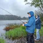 OUTDOORS: Anglers fish through rainy opening day