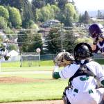 Port Angeles pitcher Colton McGuffey throws a strike to Riders catcher Joel Wood during the Roughriders 9-8 win over North Kitsap. McGuffey went 2 for 5 with an RBI double and Wood was 3 for 4 with the game-tying RBI double and scored the game-winning run as Port Angeles rallied to win the Olympic League 2A Division title.                                Dave Logan/for Peninsula Daily News