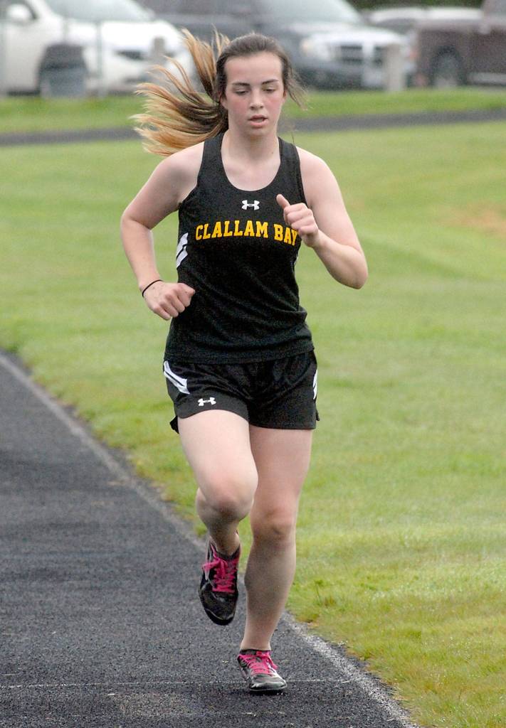 Clallam Bays Sidney Smith runs in the girls 3200 meter race on Thursday at Crescent High School. (Keith Thorpe/Peninsula Daily News)