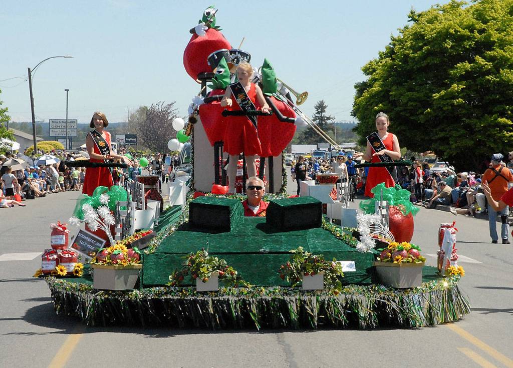The Marysville Strawberry Festival float offered a fruity theme Saturday. (Keith Thorpe/Peninsula Daily News)