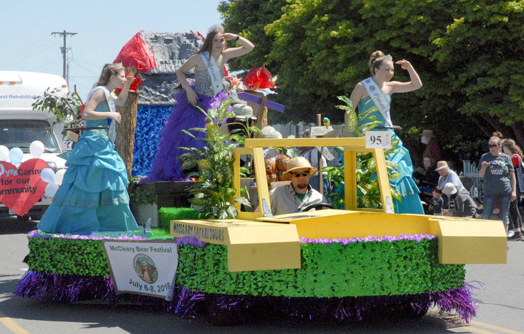 A float representing the McCleary Bear Festival rolls down the Irrigation Festival parade route. (Keith Thorpe/Peninsula Daily News)