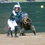 Keith Thorpe/Peninsula Daily News                                Port Angeles Sierra Robinson bats as Kingston catcher Meghan Fenwick waits for the delivery during their May 9 game at the Dry Creek athletic fields.