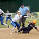 Lonnie Archibald/for Peninsula Daily News Forks Rian Peters steals second base while La Centers Ceanna Johnson awaits the throw during district softball action at Borst Park in Centralia.