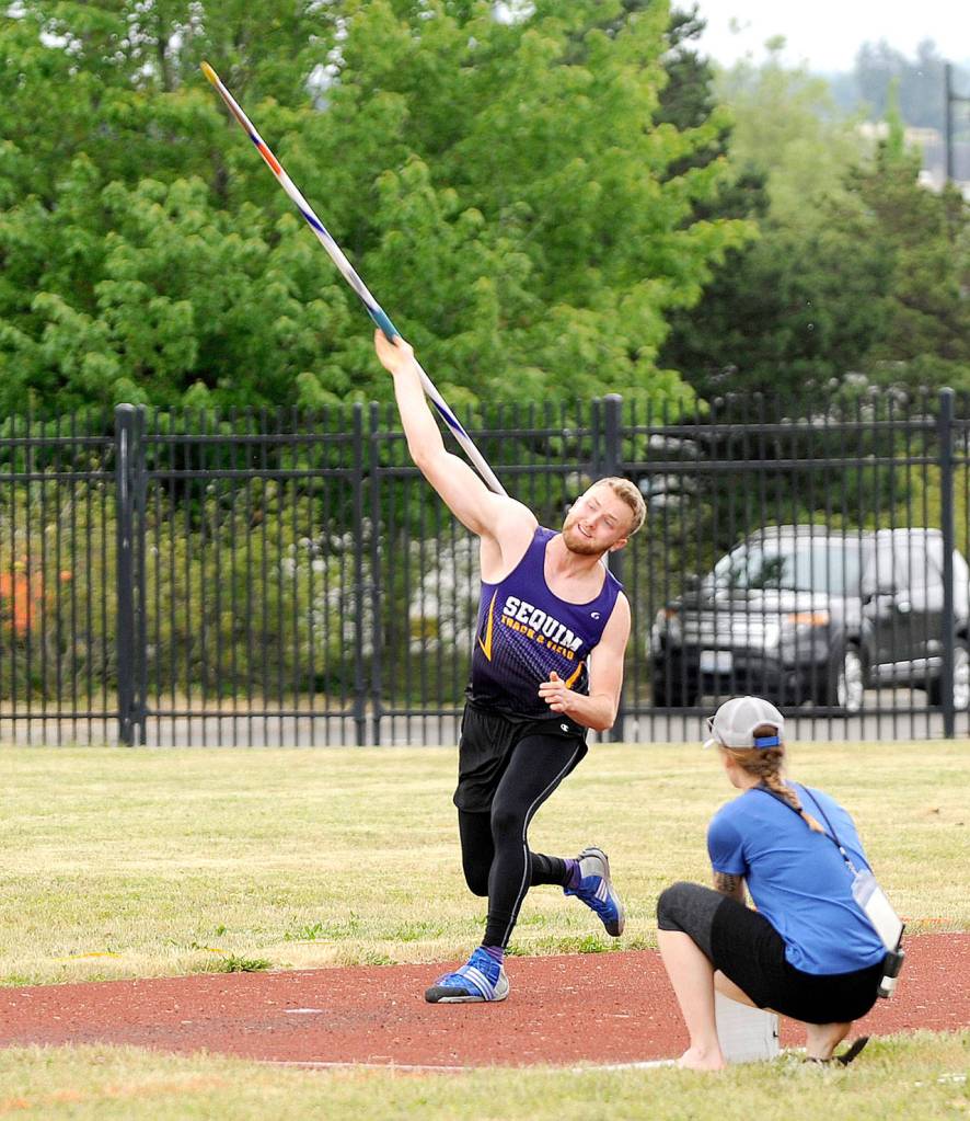 Sequims Riley Cowan throws the javelin at the West Central District III championships Saturday. Cowan finished second in the javelin with a throw of 167 feet, 2 inches. (By Michael Dashiell/Olympic Peninsula News Group)
