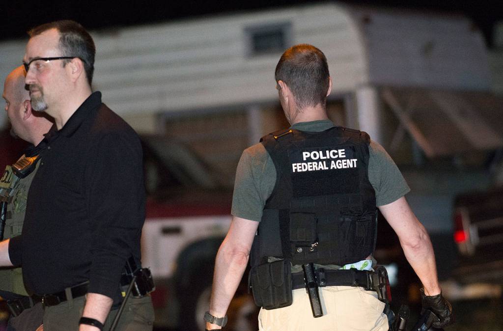 Local and federal law enforcement served search warrants and arrested multiple people at the Welcome Inn RV Park in Port Angeles late Wednesday night. (Jesse Major/Peninsula Daily News)