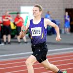 Sequims Murray Bingham carries the baton during the preliminaries of the 4x400 relay at the 2A state Track and Field Championships at Mount Tahoma High School. Sequim came in third in its heat and moved on to the finals late Saturday afternoon, seeded fifth. Other 4x400 members are Logan Laxson, Darren Salazar and Alec Shingleton. (Michael Dashiell/Olympic Peninsula News Group).