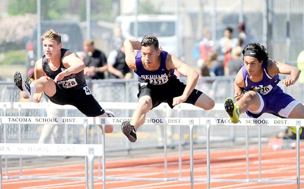 Sequims Riley Martin runs in the 110-meter hurdles at the 2A state Track and Field Championships at Mount Tahoma High School, finishing third in the state with a time of 15.30. (Michael Dashiell/Olympic Peninsula News Group)