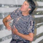 Dance, mime and voice actor Christian Swenson of Seattle practices what he calls human jazz on Saturday on the Main Stage in Vern Burton Community Center. (Keith Thorpe/Peninsula Daily News)