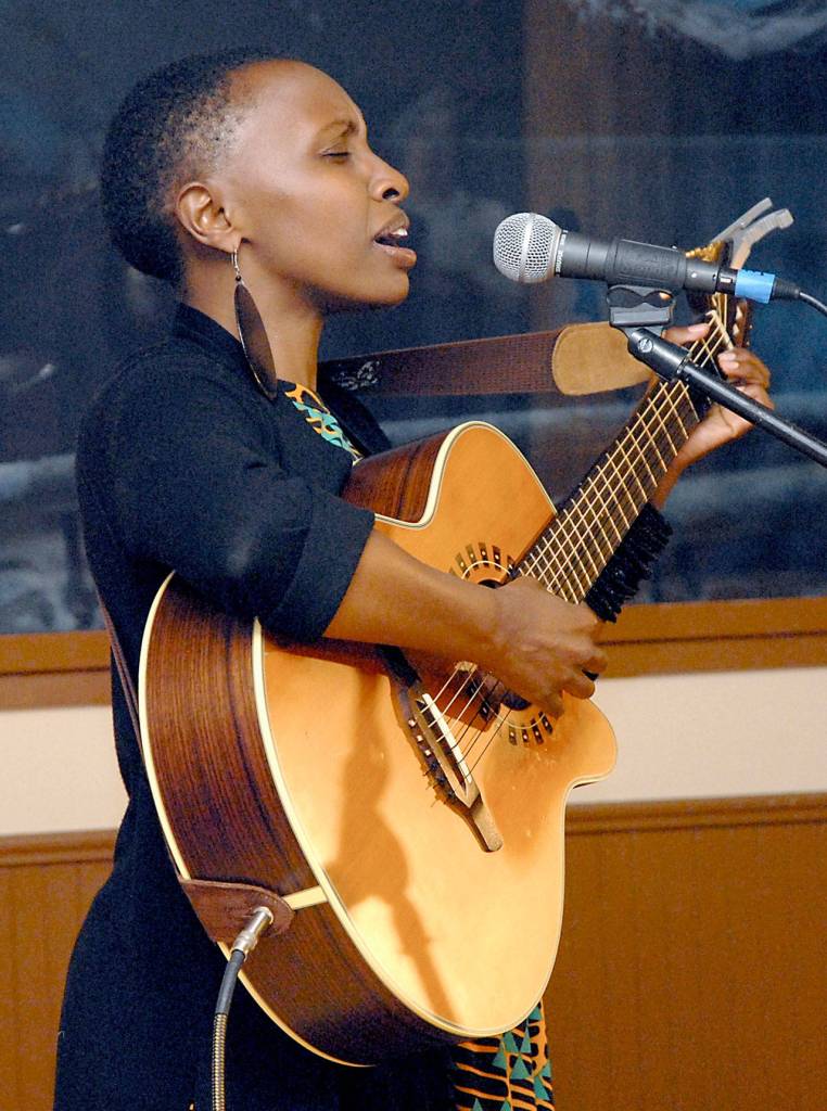Afro-folk singer Naomi Wachira, who was born in Kenya and now lives in Seattle, shares her songs from the second stage at the Naval Elks Lodge on Saturday. (Keith Thorpe/Peninsula Daily News)