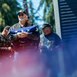 American Legion Riders from Post No. 29 prepare to raise the American flag during the Captain Joseph House Memorial service on Sunday. (Jesse Major/Peninsula Daily News)
