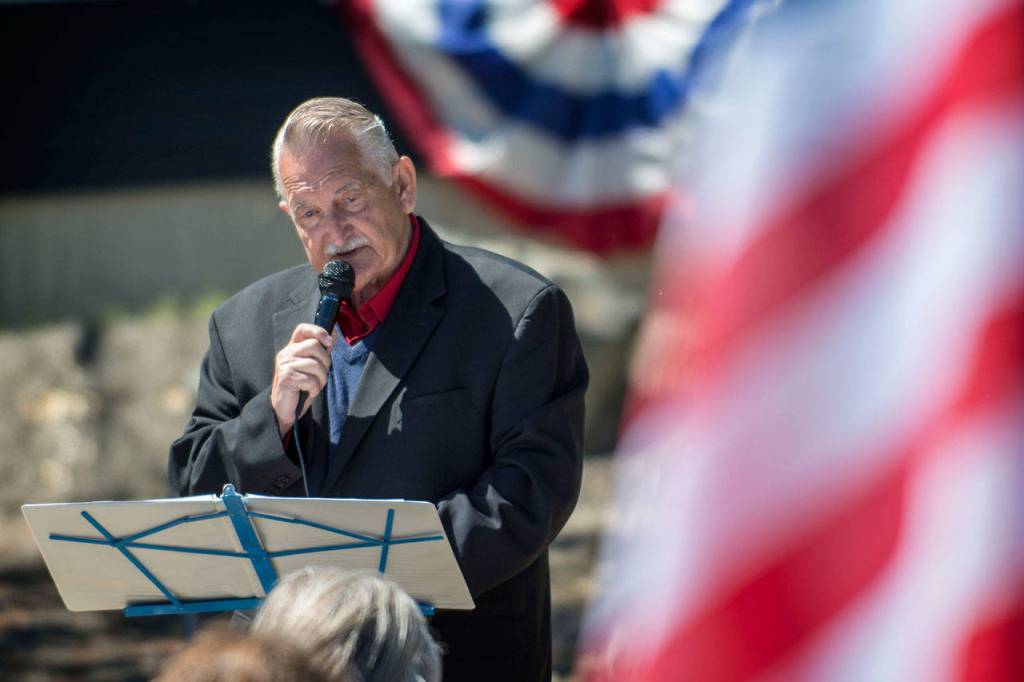 Joe Borden, vice president of the Captain Joseph House board, speaks during the Captain Joseph House Memorial service Sunday. (Jesse Major/Peninsula Daily News)